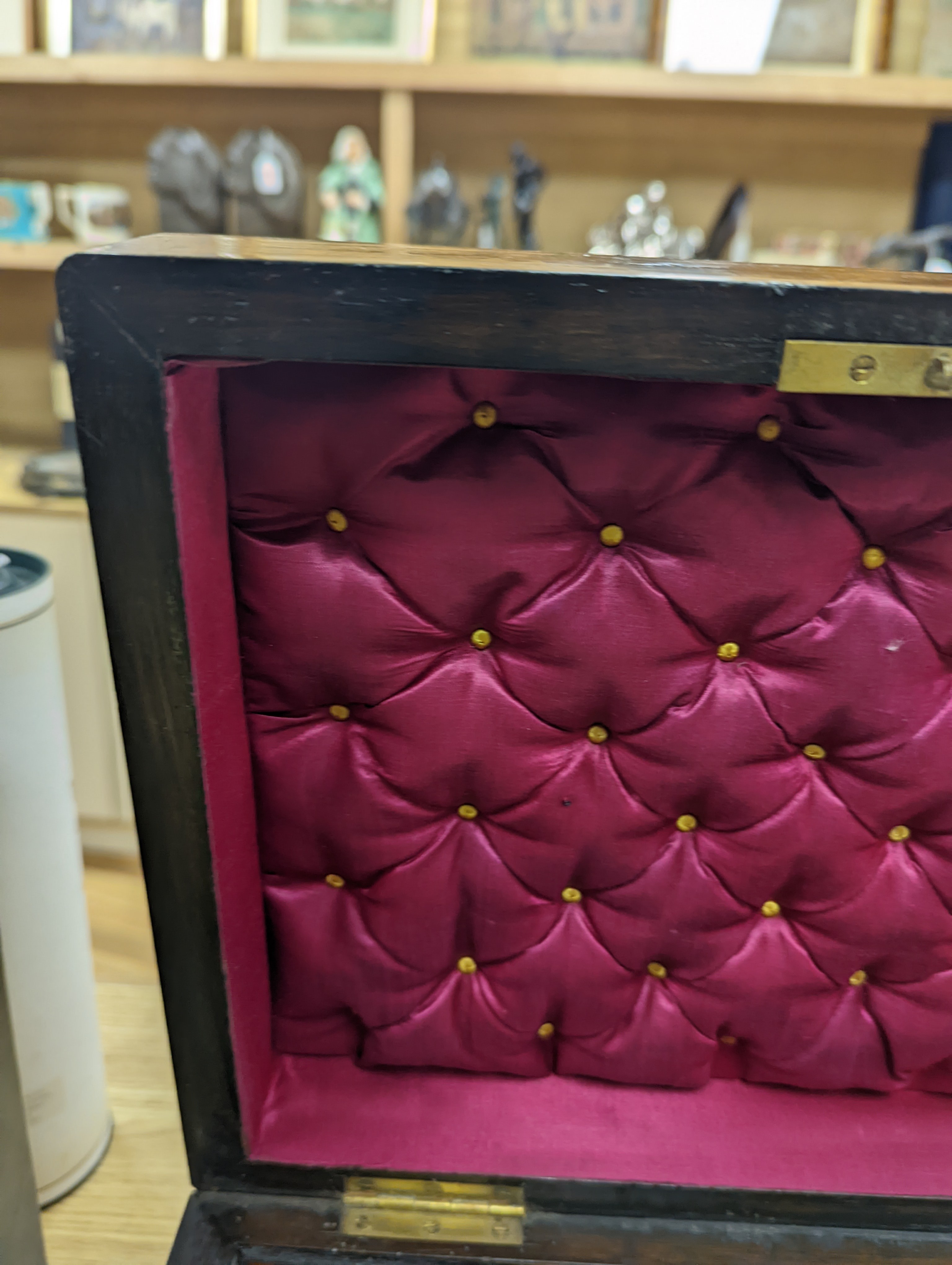 A Victorian walnut sewing casket, 34cm, containing sewing related accessories